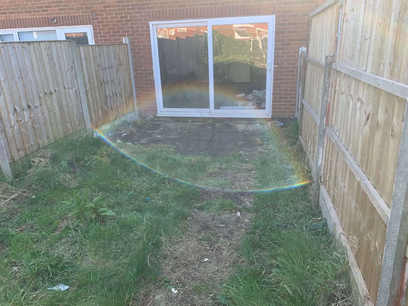 Garden waste, old sofa and patio rubbish being cleared by Paisley's in Manchester
